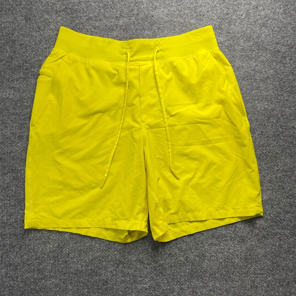 Lululemon Pace Breaker Un-Lined Shorts 7 Mens Medium Electric Yellow LM7AJBS